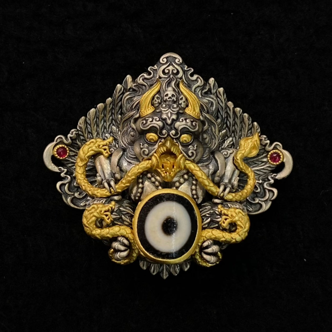 S925 Silver Garuda Pendant with a Centrally Inlaid Dzi Bead