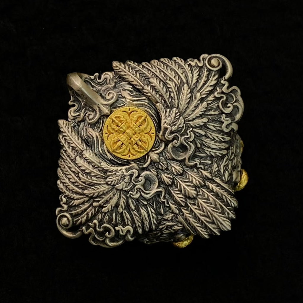 S925 Silver Garuda Pendant with a Centrally Inlaid Dzi Bead