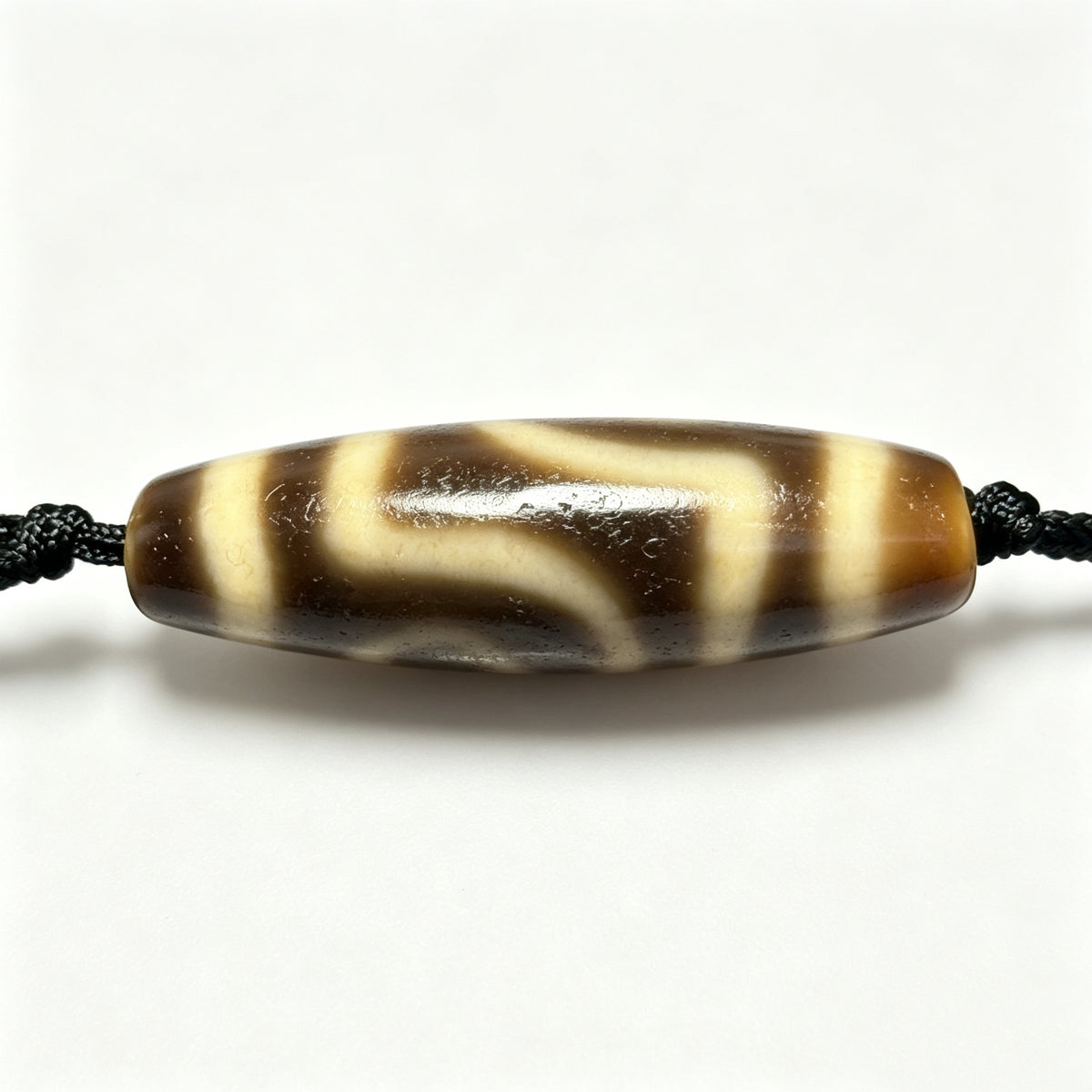 Two-Eyed Dzi Bead Artisanal Dzi Bead - Quality Hand-Finished Replica (Best Seller)