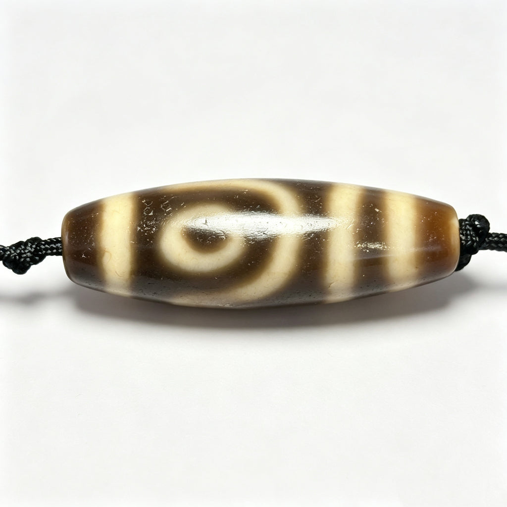 Two-Eyed Dzi Bead Artisanal Dzi Bead - Quality Hand-Finished Replica (Best Seller)