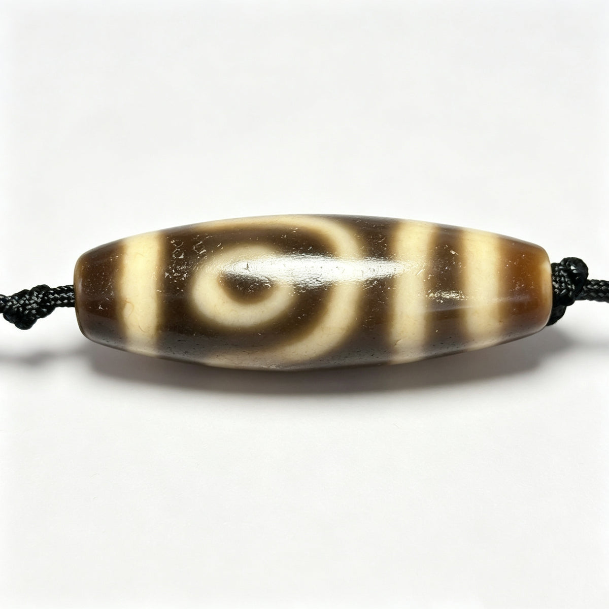 Two-Eyed Dzi Bead Artisanal Dzi Bead - Quality Hand-Finished Replica (Best Seller)