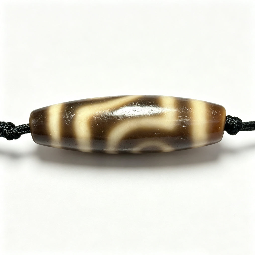 Two-Eyed Dzi Bead Artisanal Dzi Bead - Quality Hand-Finished Replica (Best Seller)