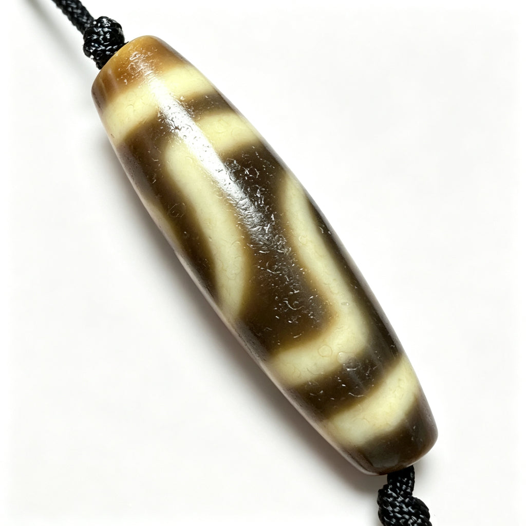 Two-Eyed Dzi Bead Artisanal Dzi Bead - Quality Hand-Finished Replica (Best Seller)