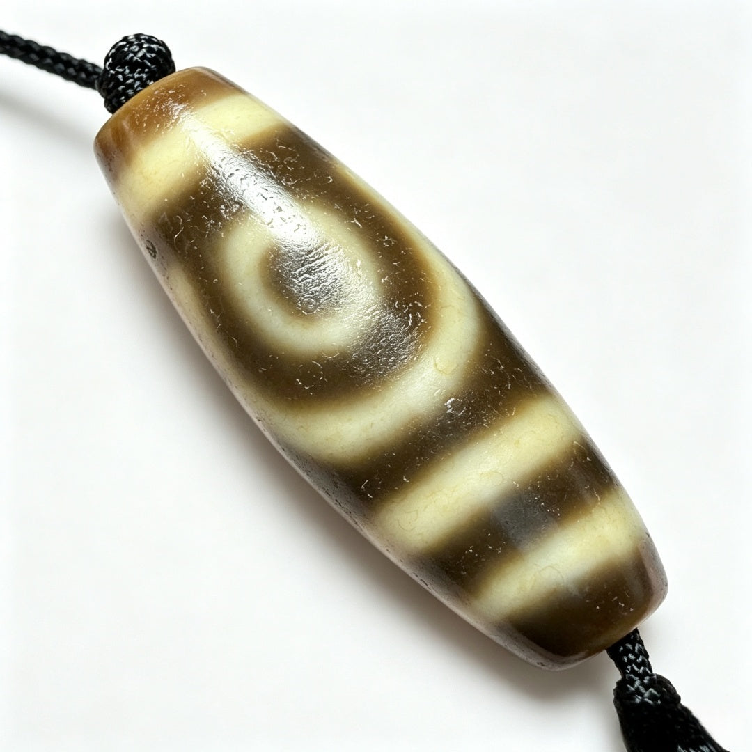 Two-Eyed Dzi Bead Artisanal Dzi Bead - Quality Hand-Finished Replica (Best Seller)