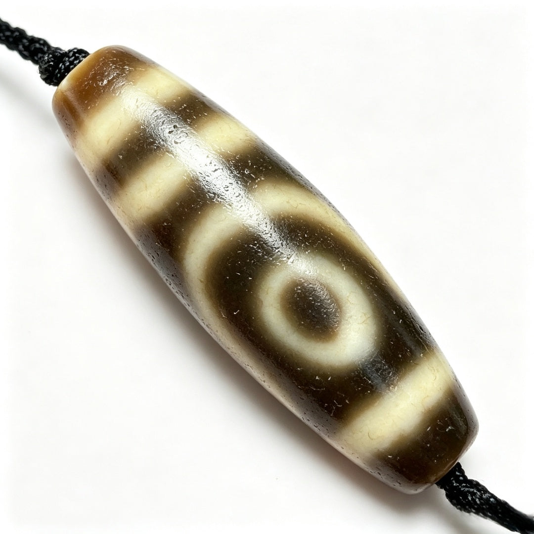 Two-Eyed Dzi Bead Artisanal Dzi Bead - Quality Hand-Finished Replica (Best Seller)